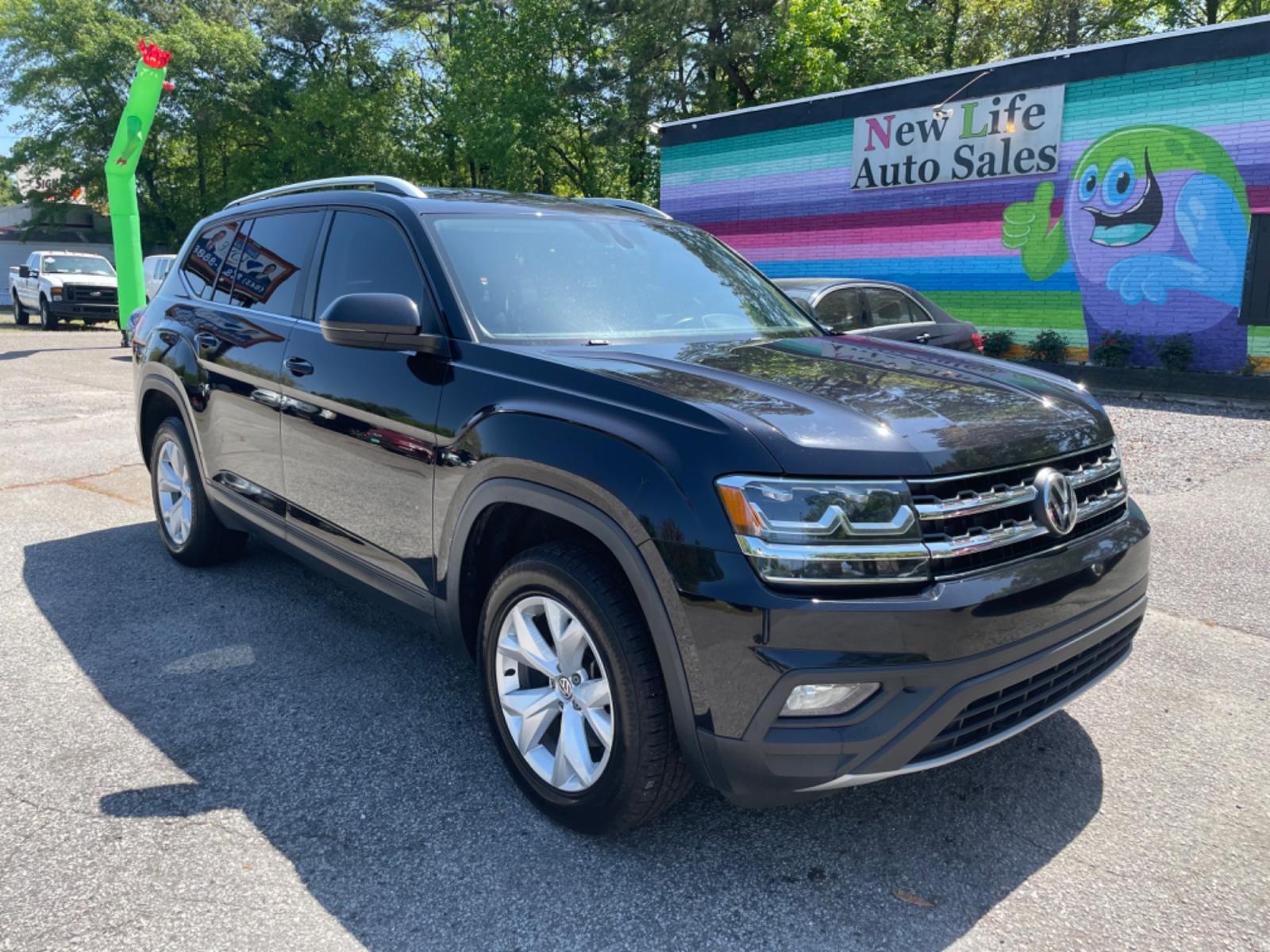2019 BLACK VOLKSWAGEN ATLAS V6 SE (1V2DR2CA0KC) with an 3.6L engine, Automatic transmission, located at 5103 Dorchester Rd., Charleston, SC, 29418-5607, (843) 767-1122, 36.245171, -115.228050 - Local Trade-in with Leather, Third Row, Backup Camera, AUX/Bluetooth/USB, Dual Climate Control, Power Everything (windows, locks, seats, mirrors), Heated Seats, Rear In-door Sunshades, Push Button Start, Keyless Entry, Alloy Wheels. 121k miles Located at New Life Auto Sales! 2023 WINNER for Post & - Photo #0
